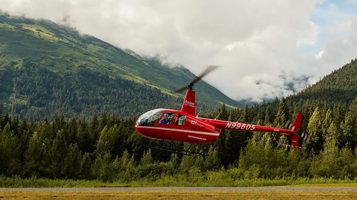 Robinson R44 Raven II helicopter photographed in flight or on the ground
